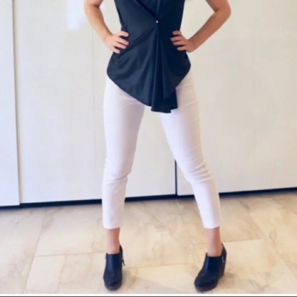White textured snake print pants